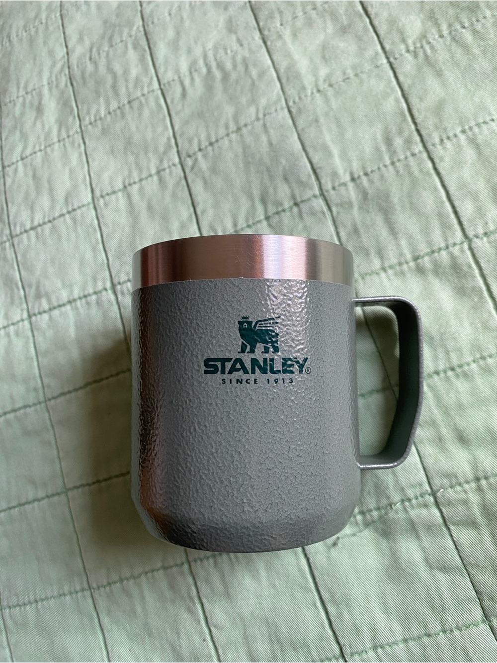 Stanley Mug on Quilted Surface